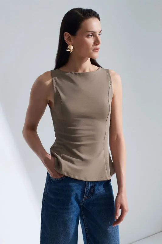 Fitted Sleeveless Peplum Blouse - Dilvin