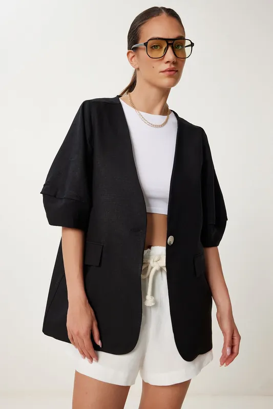 Oversized woven jacket with button closure - Happiness Istanbul
