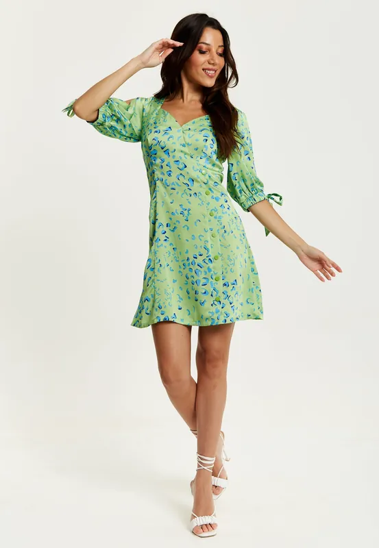 Animal Print Mini Dress With a Back Tie Up in Mint - Liquorish
