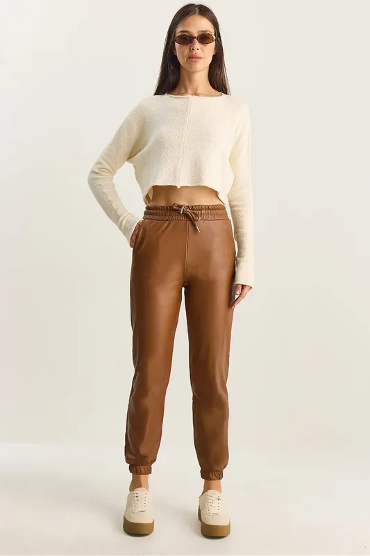 Faux Leather Jogger Pants with Tie Closure - Bianco Lucci