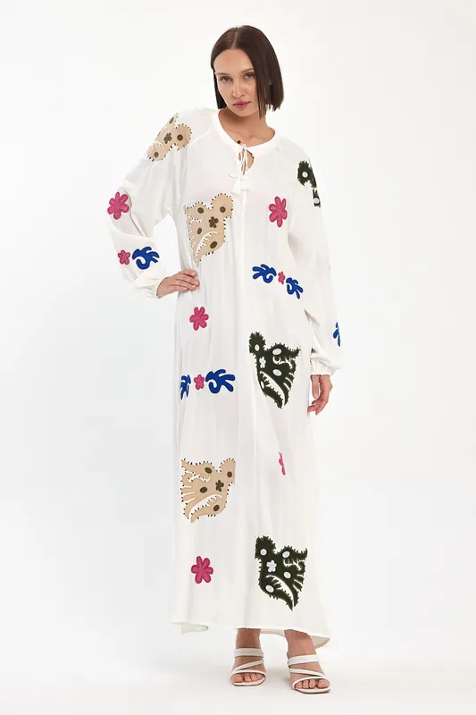 Embroidered Maxi Dress with Statement Motifs in White - Belissh