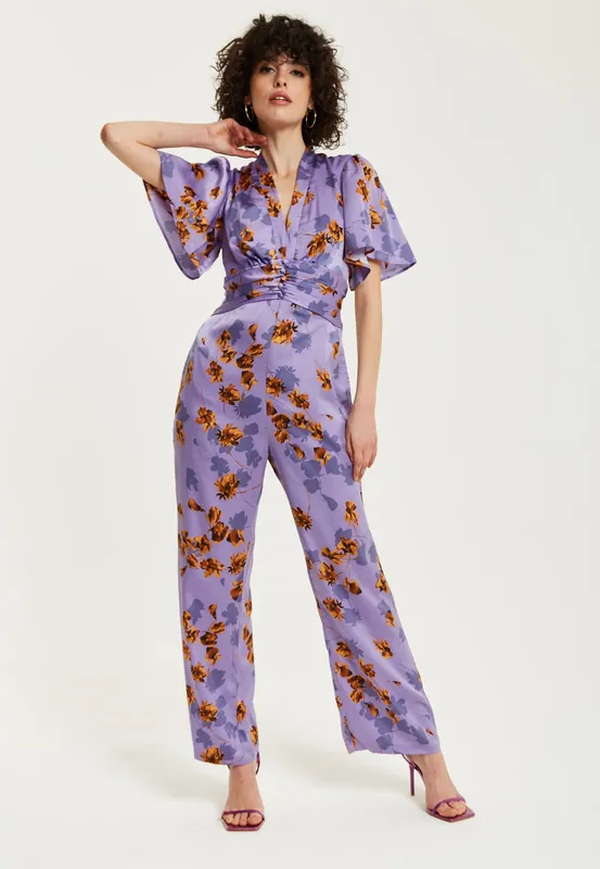 Purple Floral Wide Leg Jumpsuit With Angel Sleeves - Liquorish