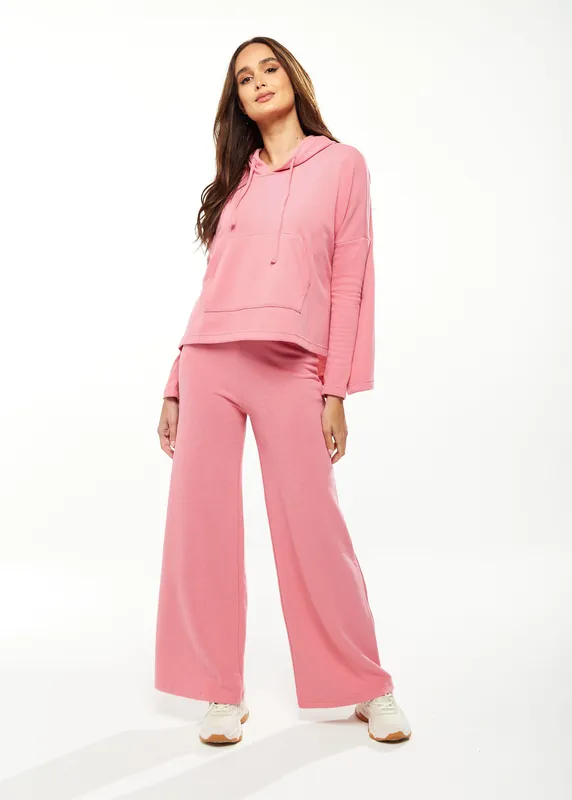 Oversized Hooded Sweatshirt with Front Pocket in Pink - Liquorish