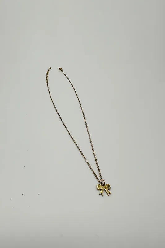 Mini Bow Pendant Necklace in Gold - SVNX