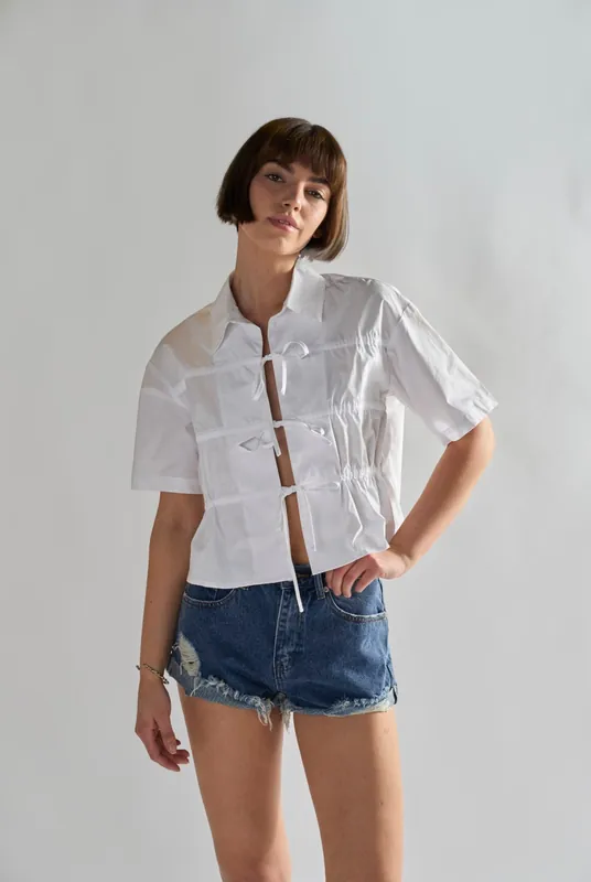 Mid-Stonewash Ripped Denim Shorts
